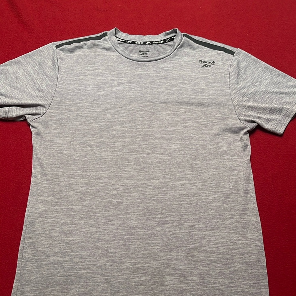 Dry fit Reebok athletic tee shirt.
